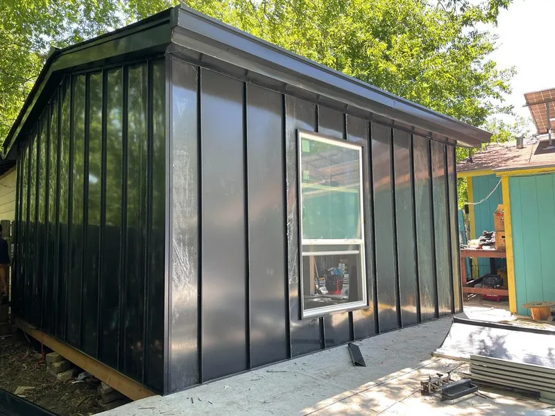 Black standing seam metal wall panels for Roof Inspection in Tucson Mountains