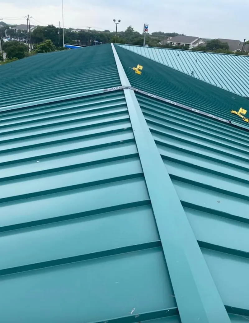 Green commercial metal roof ridge and valley for Metal Roof Repair in Tucson Mountains